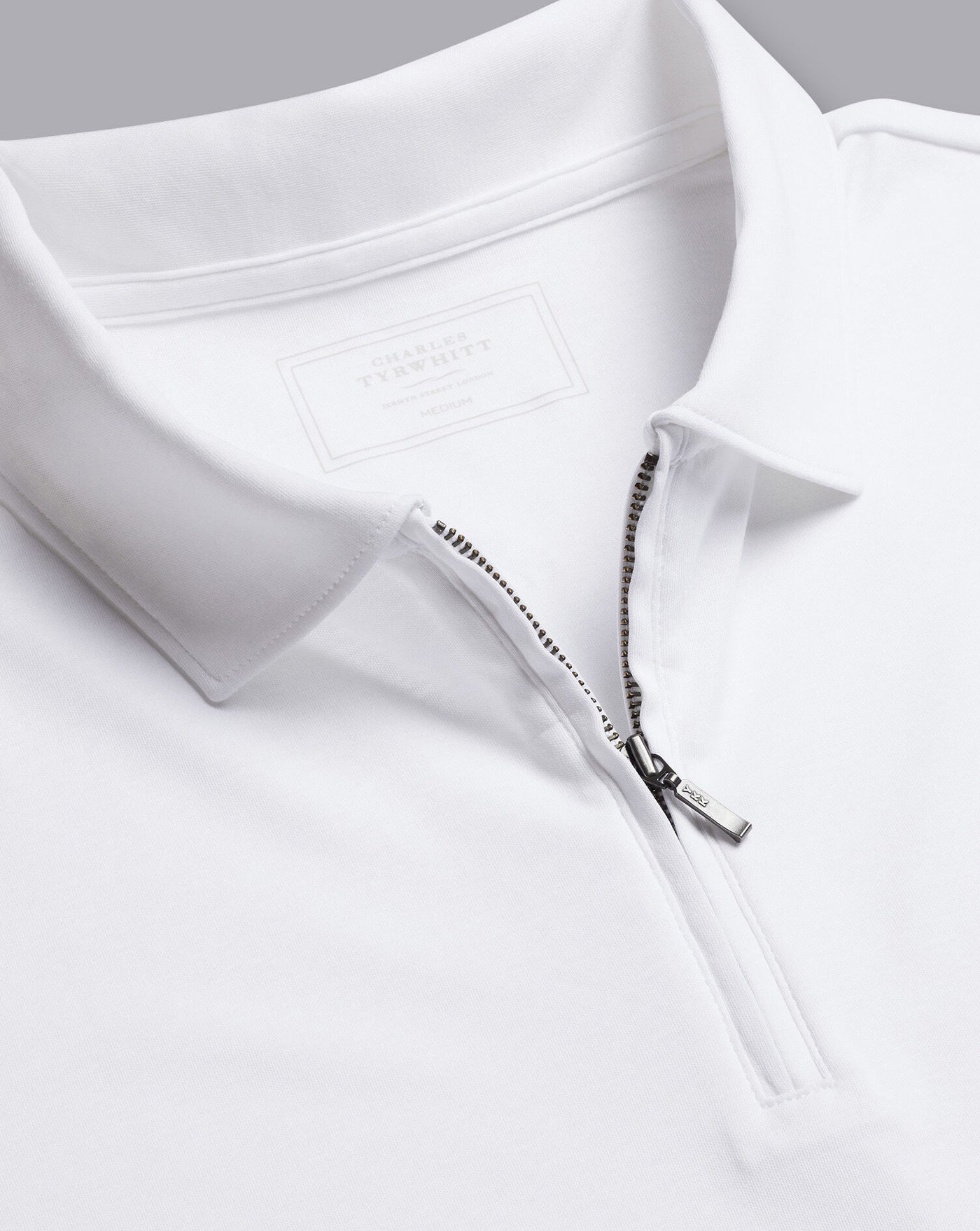 WHITE PLAIN SHORT SLEEVE ZIP JERSEY POLO